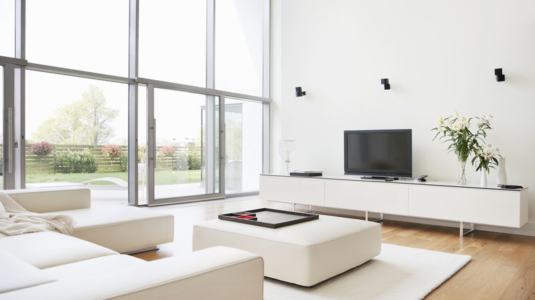 White living room with windows and natural light