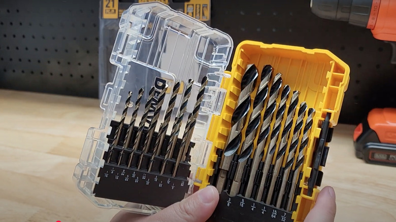 Person holding a DeWalt drill bit set