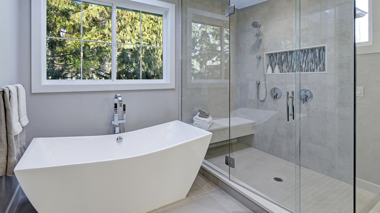 freestanding tub in small bathroom