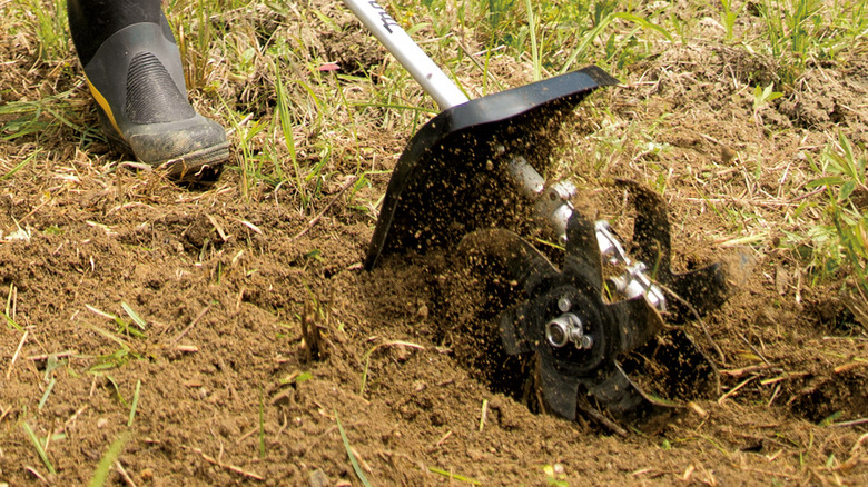 Makita cultivator couple shaft attachment in use