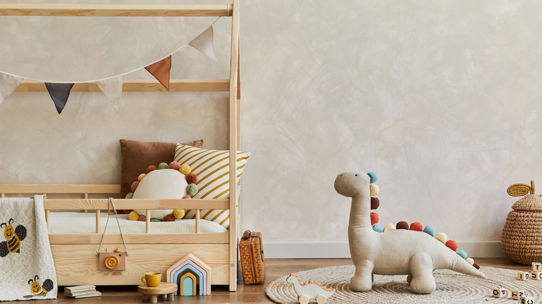 wooden furniture with dinosaur toy