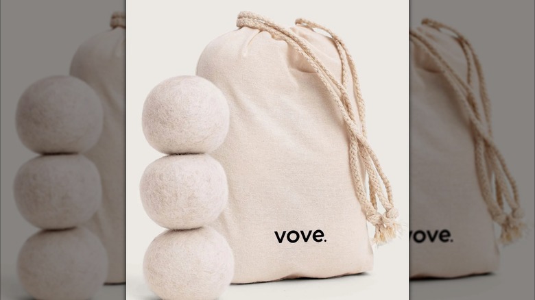 View of Vove Hemp Dryer balls next to linen bag