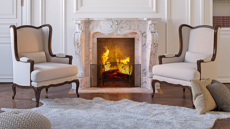 Marble fireplace arm chairs