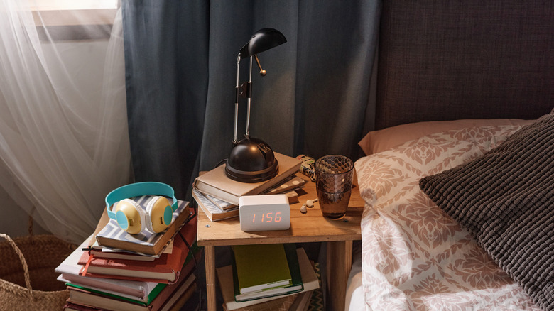 Alarm clock on bedside table