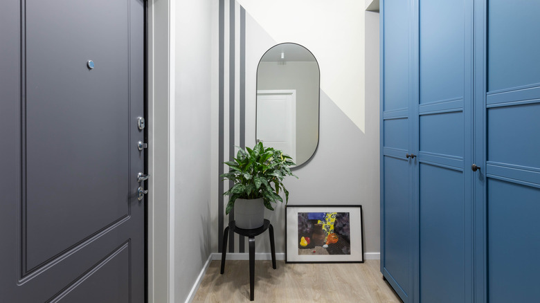 gray and blue painted hallway