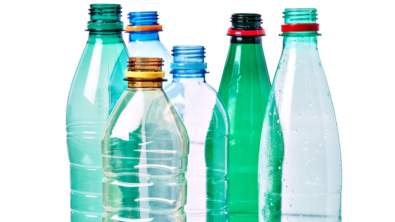 Plastic bottles on white background