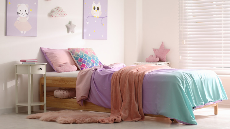 colorful bed with wooden frame