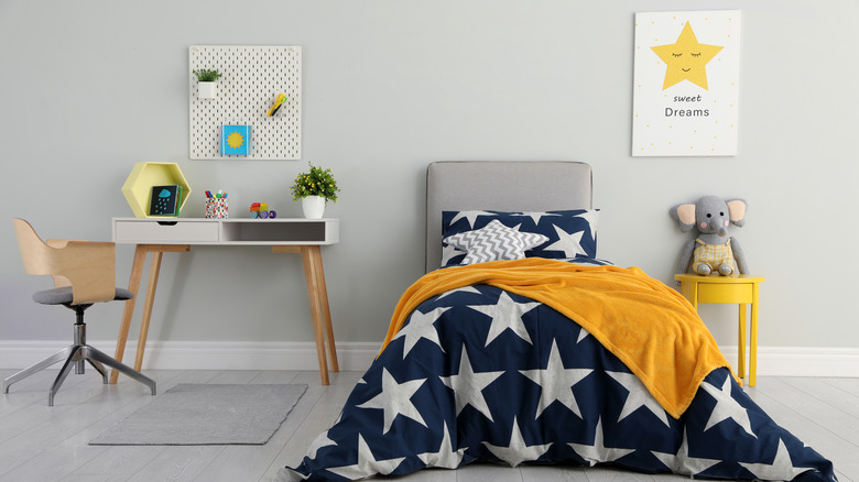 gray headboard on child's bed