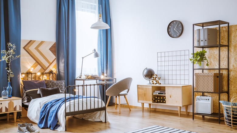 bed with wooden paneling 