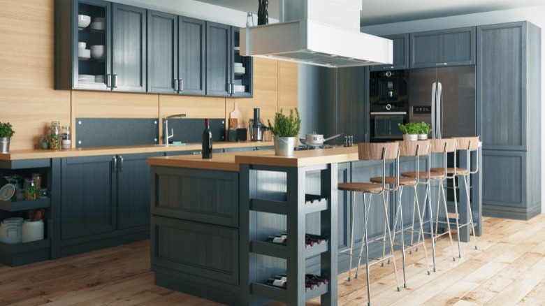 Wood kitchen with blue cupboards