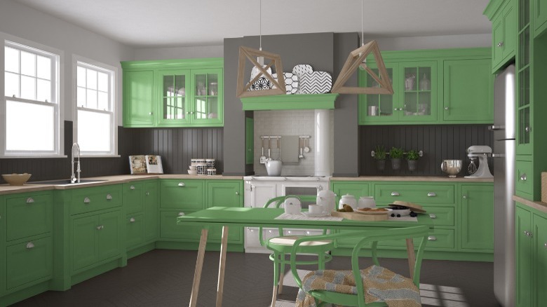 Green kitchen with white accents