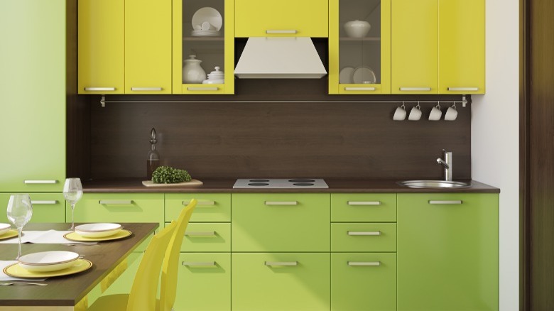 Green and yellow kitchen cupboards