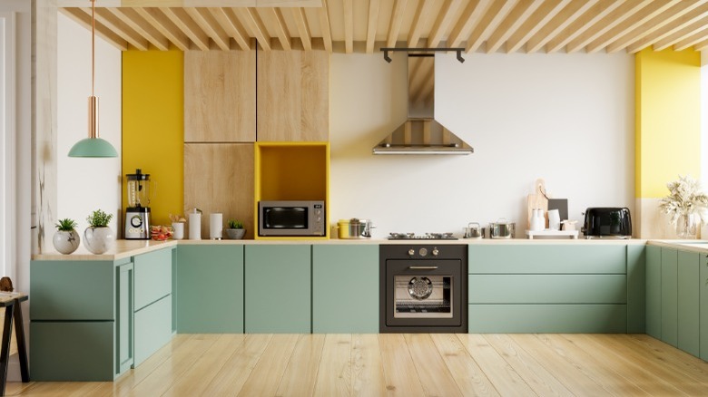 wood kitchen with yellow and green