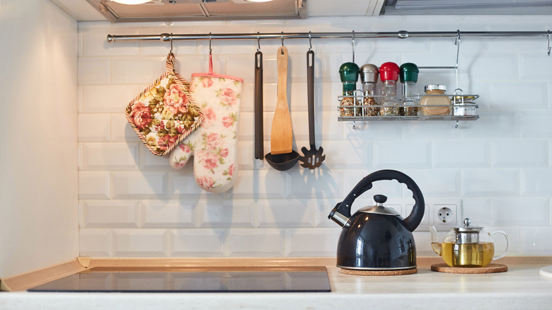 Stove hanging utensil rack