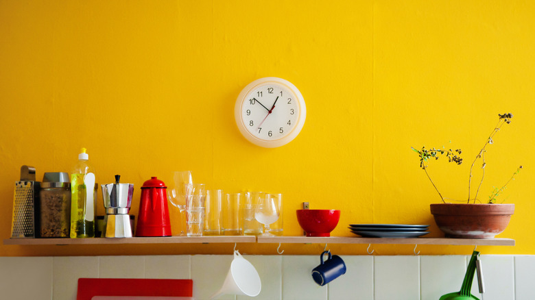 Kitchen shelf yellow wall