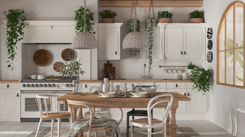 White kitchen lots of plants