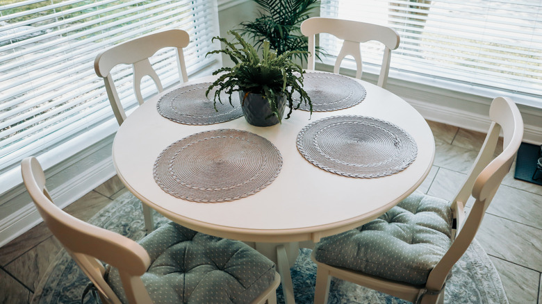 white round table with chairs