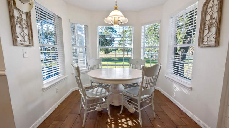 white farmhouse table and chairs