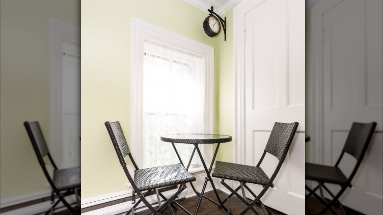 table and chairs in corner