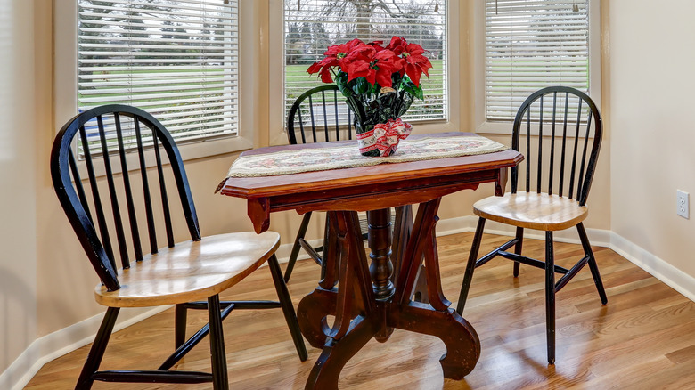 table and three chairs