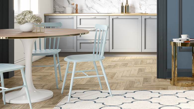 pastel blue chairs around table