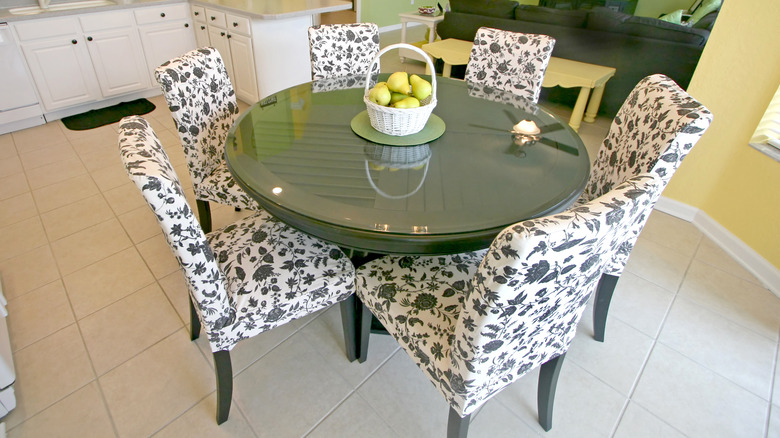 floral chairs around a table