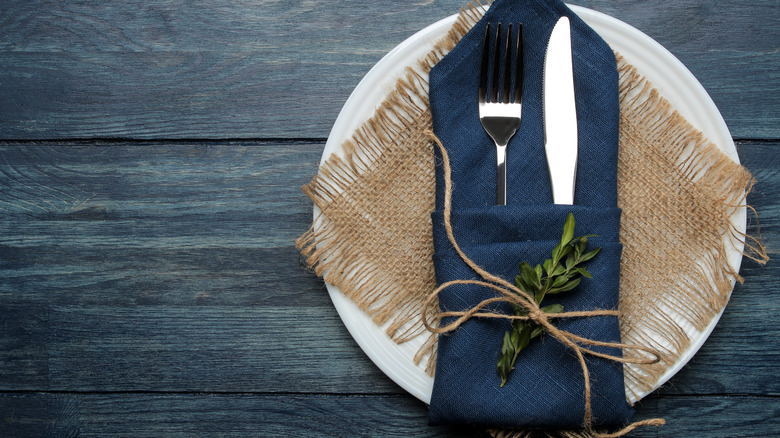 burlap underneath decorated napkin