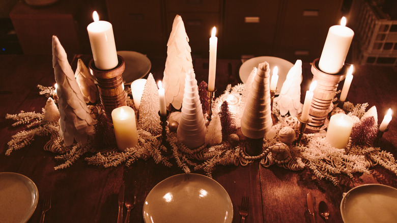trees and candles in centerpiece 