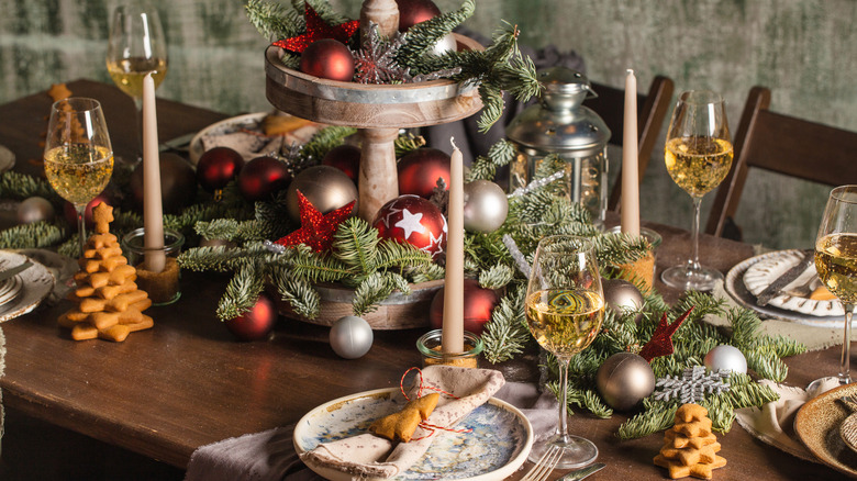 tall centerpiece with greenery 