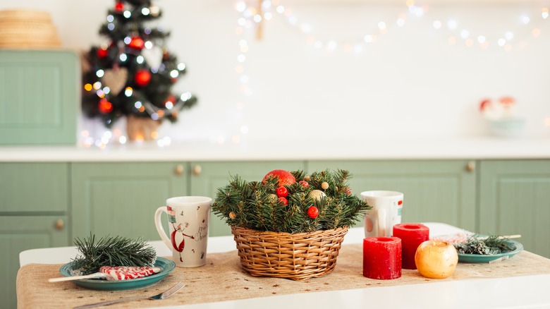 pine branches in wicker basket