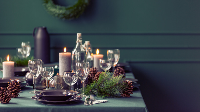 purple dishes on green tablecloth