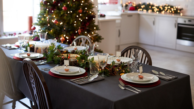 black tablecloth with festive napkins