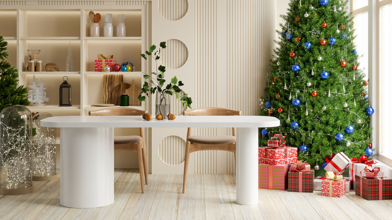 Christmas decorations around white table
