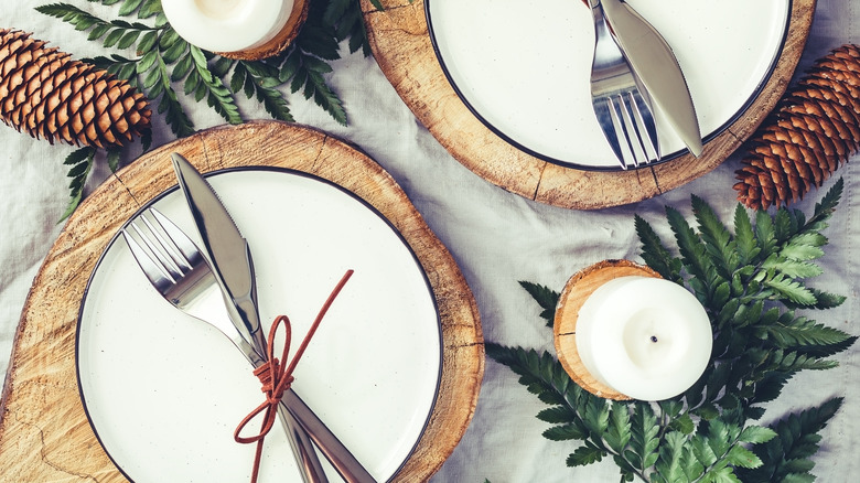 wooden slabs underneath white plates