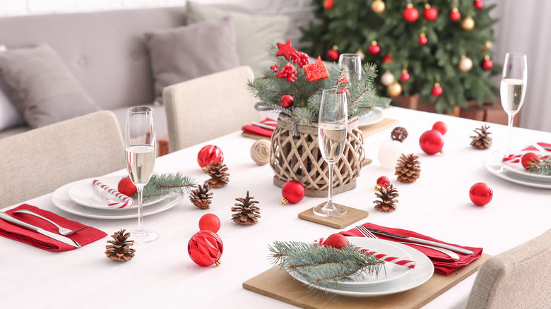 pinecones and ornaments on table