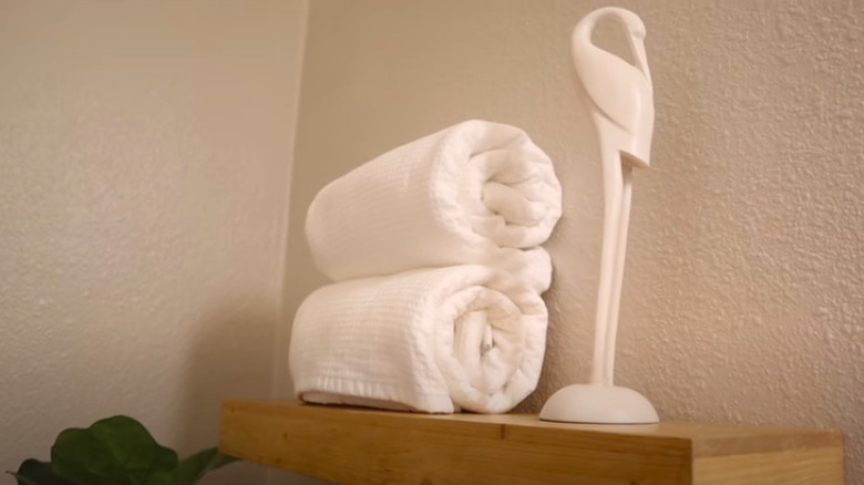 Floating shelf in bathroom