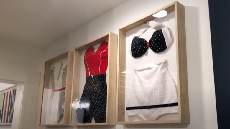 Swimsuits framed in bathroom