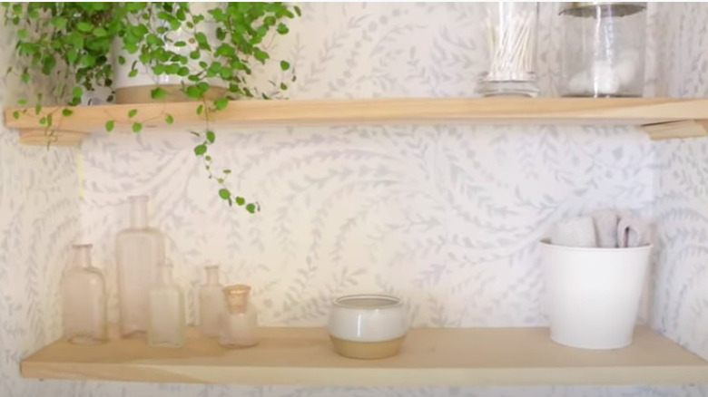 Floating shelf in bathroom