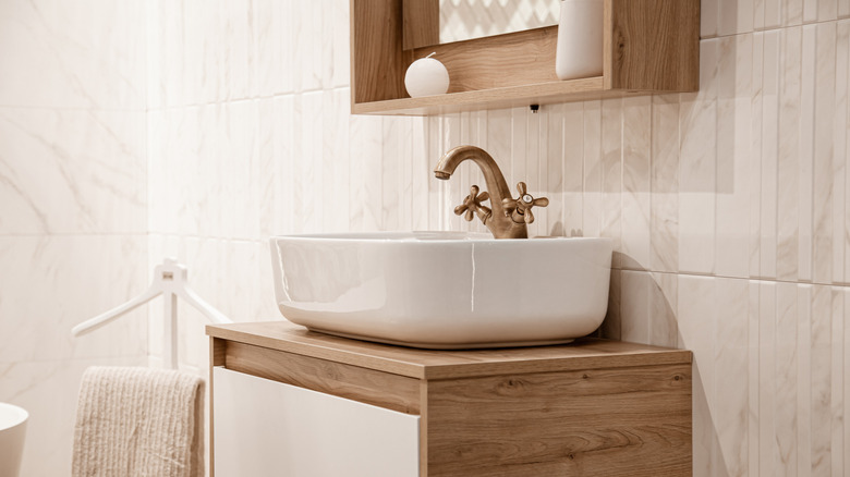 White and gold bathroom sink