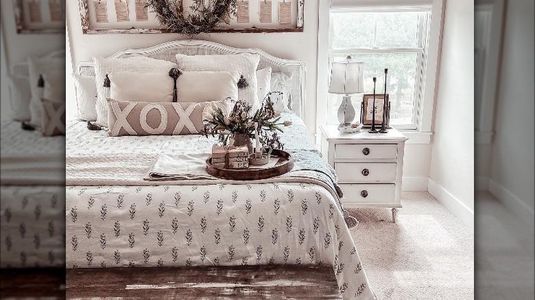 Romantic primary farmhouse bedroom