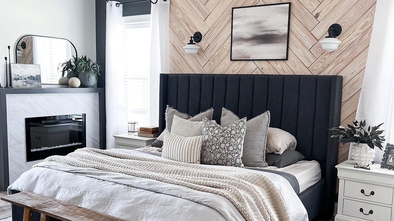 Bedroom with herringbone accent wall