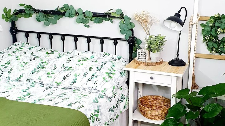 Cozy bedroom with green foliage