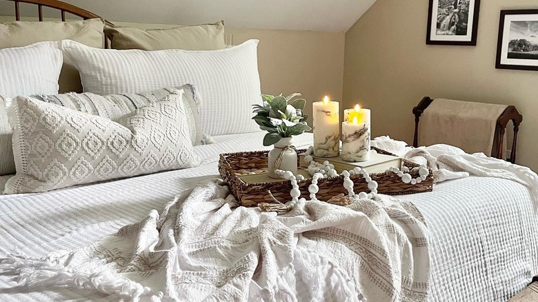 Styled tray on cozy bed