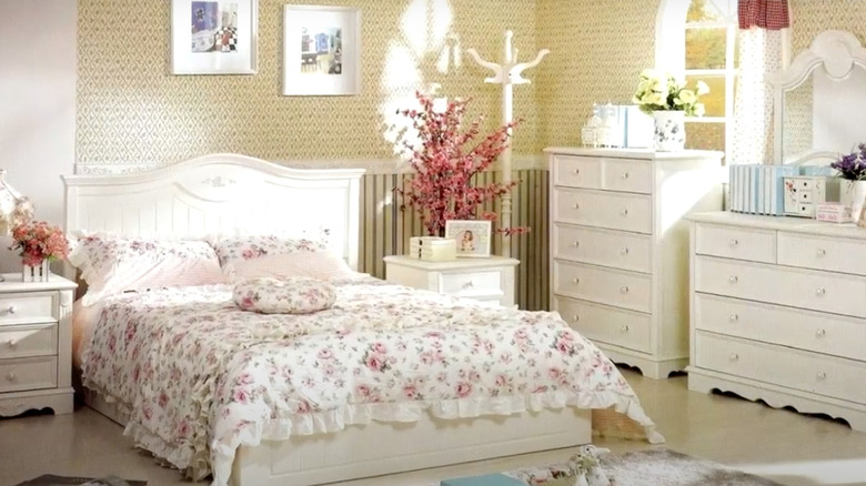 French country bedroom with wallpaper