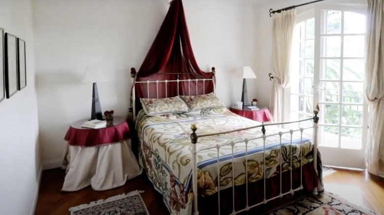 French country bedroom with red velvet