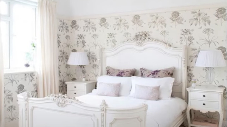 French country bedroom with wallpaper