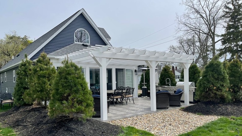 Trees surround lakefront home