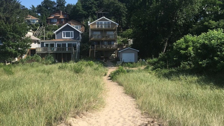 Multi-story homes with beach path