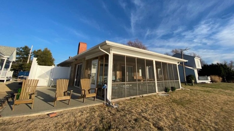 Screened in porch of beach house