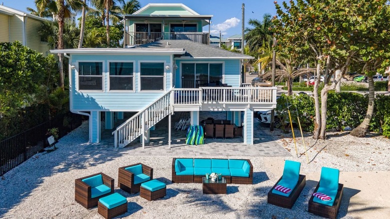 Beach house with outdoor furniture